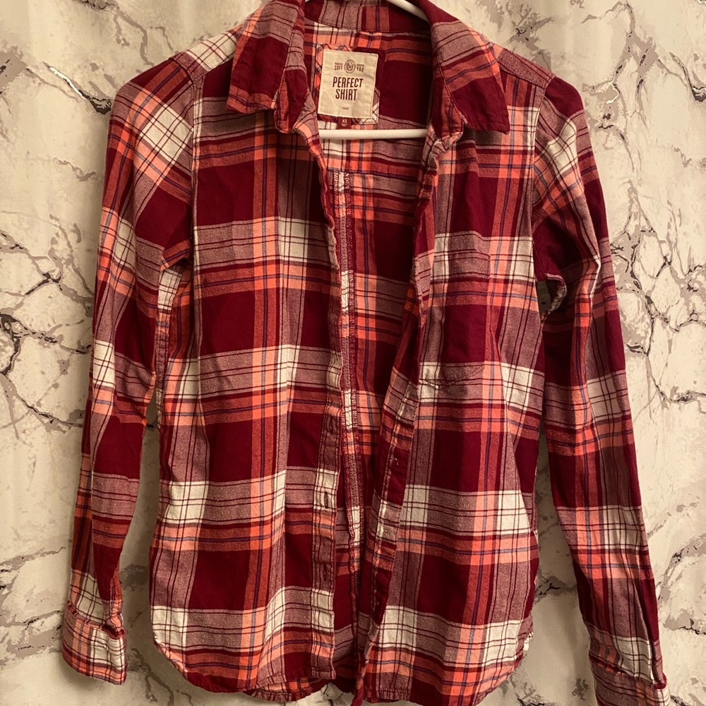 An array of pink in this button down flannel, size xs